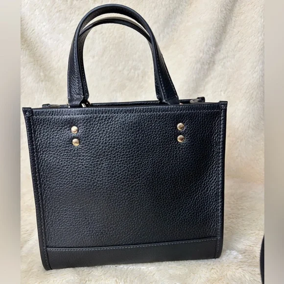 Coach Dempsey leather bag